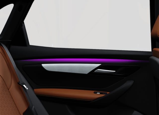 VinFast VF 8 door panel with purple ambient lighting