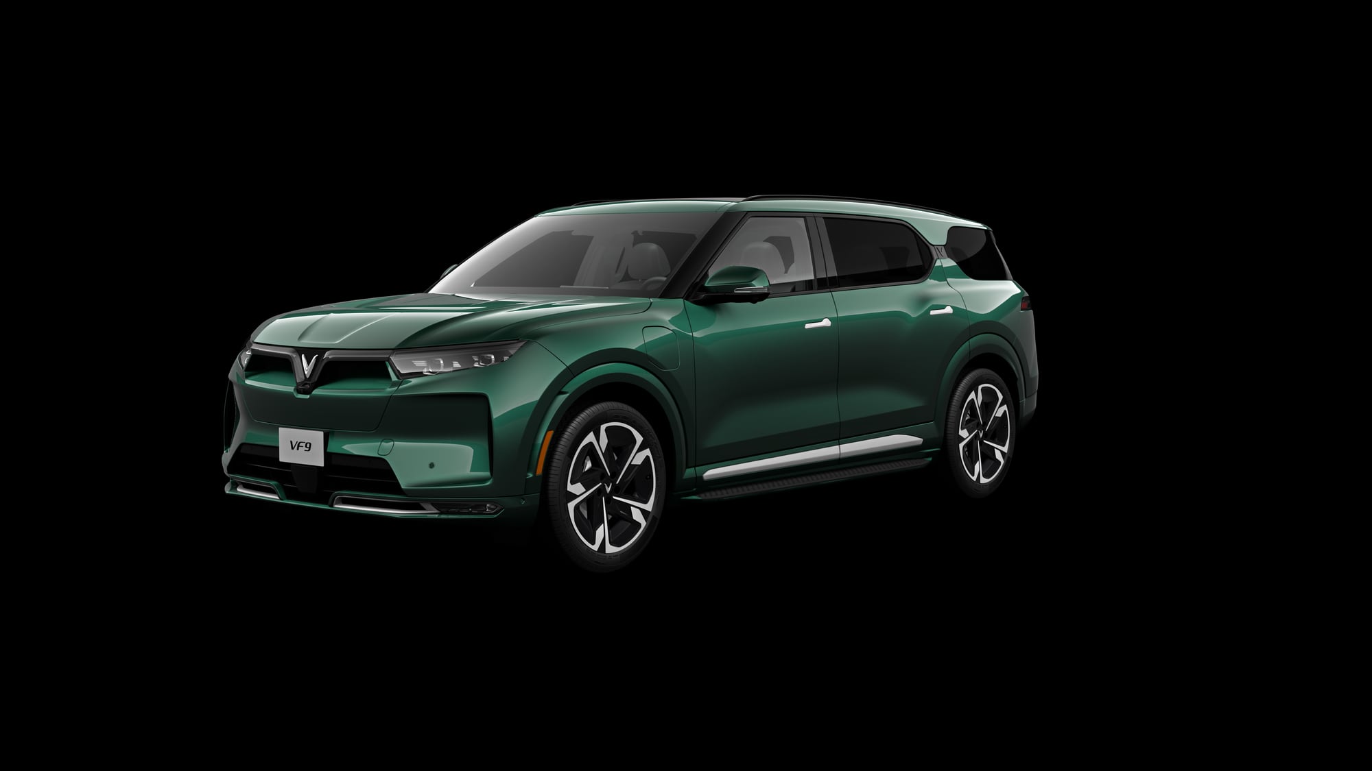 VinFast VF 9 Plus in green, front three-quarter render